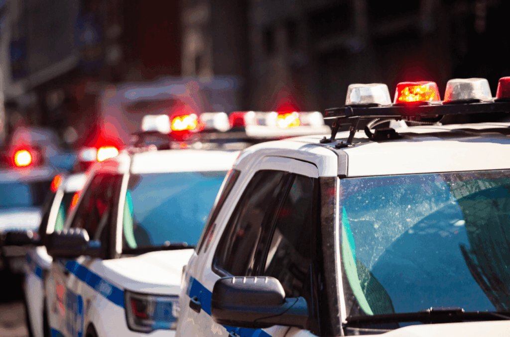 Police cars with lights flashing